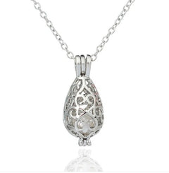 Natural Pearl Cage Necklace – Oyster-Inspired Pendant Collection