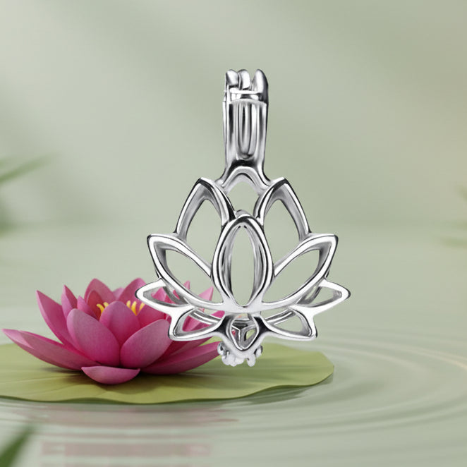 A sterling silver lotus flower pendant charm with magenta lotus flower with a  soft green background