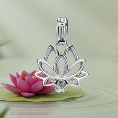 A sterling silver lotus flower pendant charm with magenta lotus flower with a  soft green background