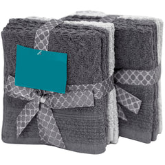 Two folded gray towels wrapped in a gray patterned ribbon with a blank teal tag, shown on a white background.