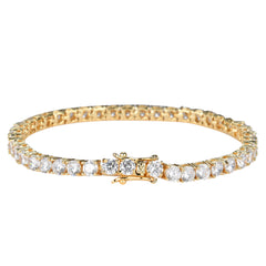 Gold bracelet with clear gemstones on a white background
