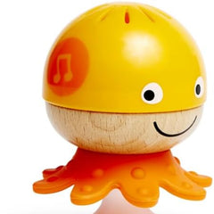 Orange toy octopus with a smiley face on a white background