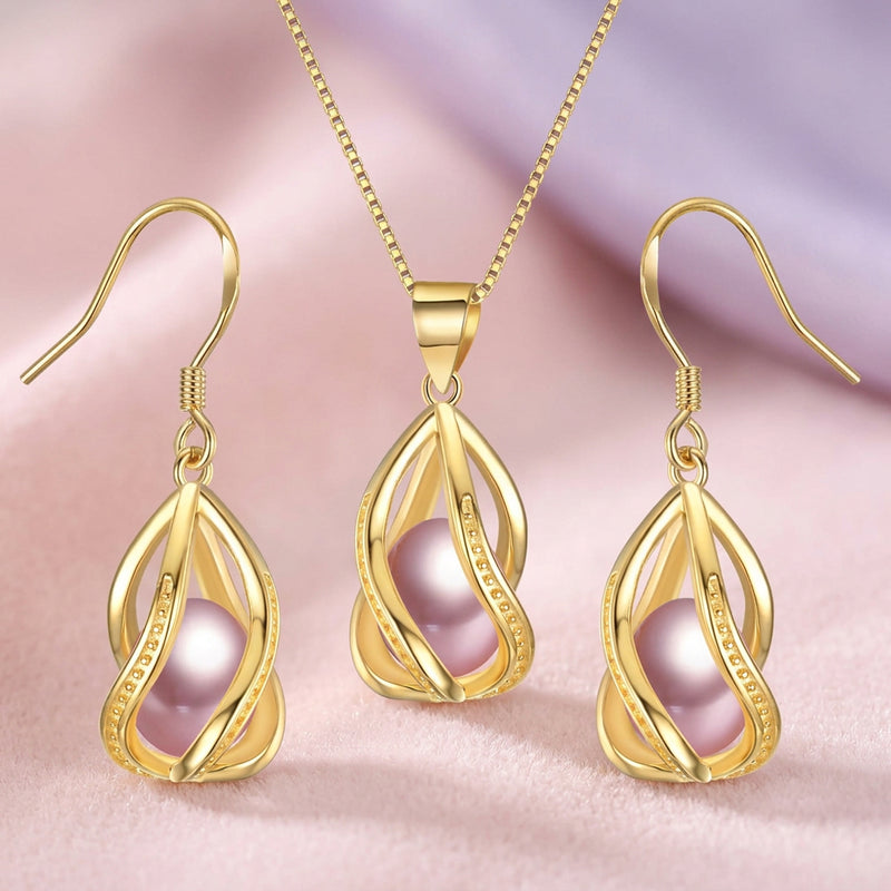 Gold jewelry set with pink pearls on a pink background