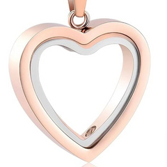 Heart-shaped pendant with rose gold and silver finish on a white background