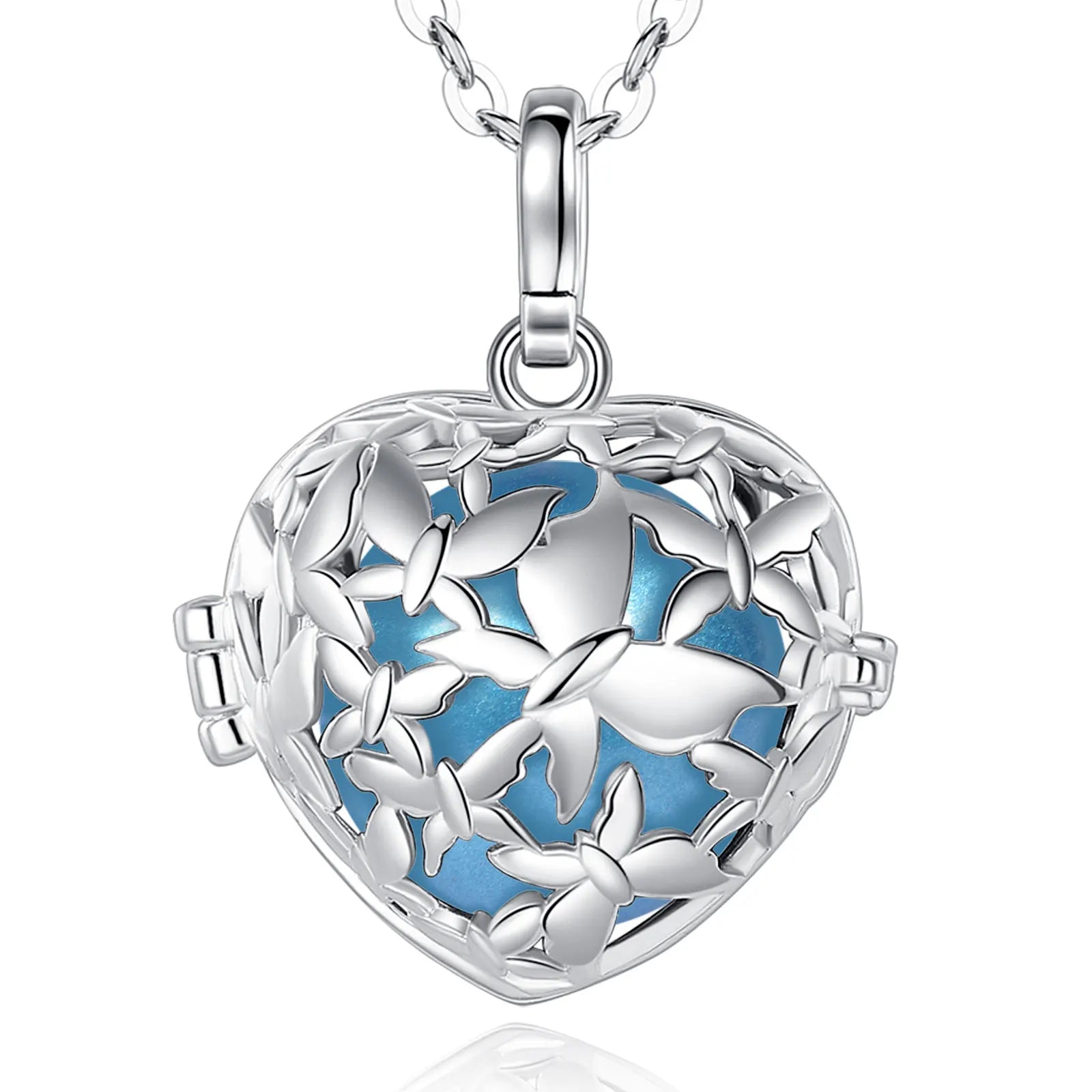 A silver heart-shaped locket pendant necklace with a butterfly cutout design and light blue enamel inlay, shown on a white background with a faint reflection below.