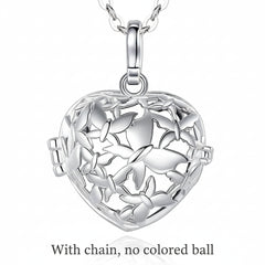 A silver heart-shaped locket pendant necklace with a butterfly cutout design, hanging from a silver chain against a white background with the words "With chain, no colored ball" below it.