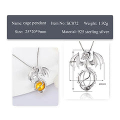 Silver dragon cage pendant necklace with a yellow amber gemstone, shown alongside a technical dimension diagram and product specifications text.
