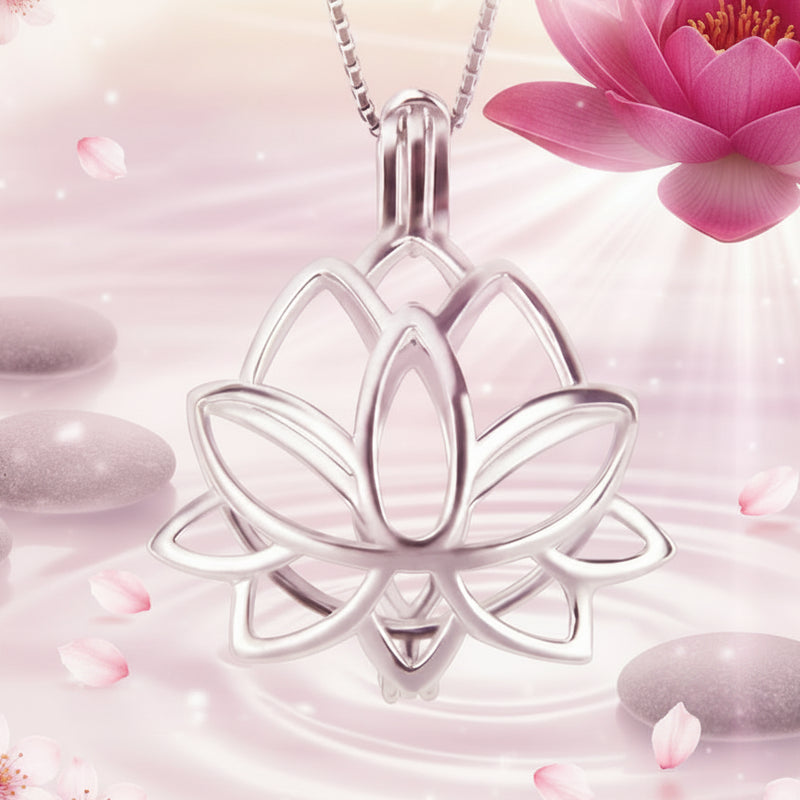A silver lotus flower pendant necklace on a matching chain, shown against spa like background with a magenta lotus flower in the top right.