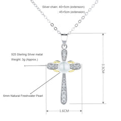 Sterling silver cross pendant necklace with a freshwater pearl center and small clear stones, shown with measurements.